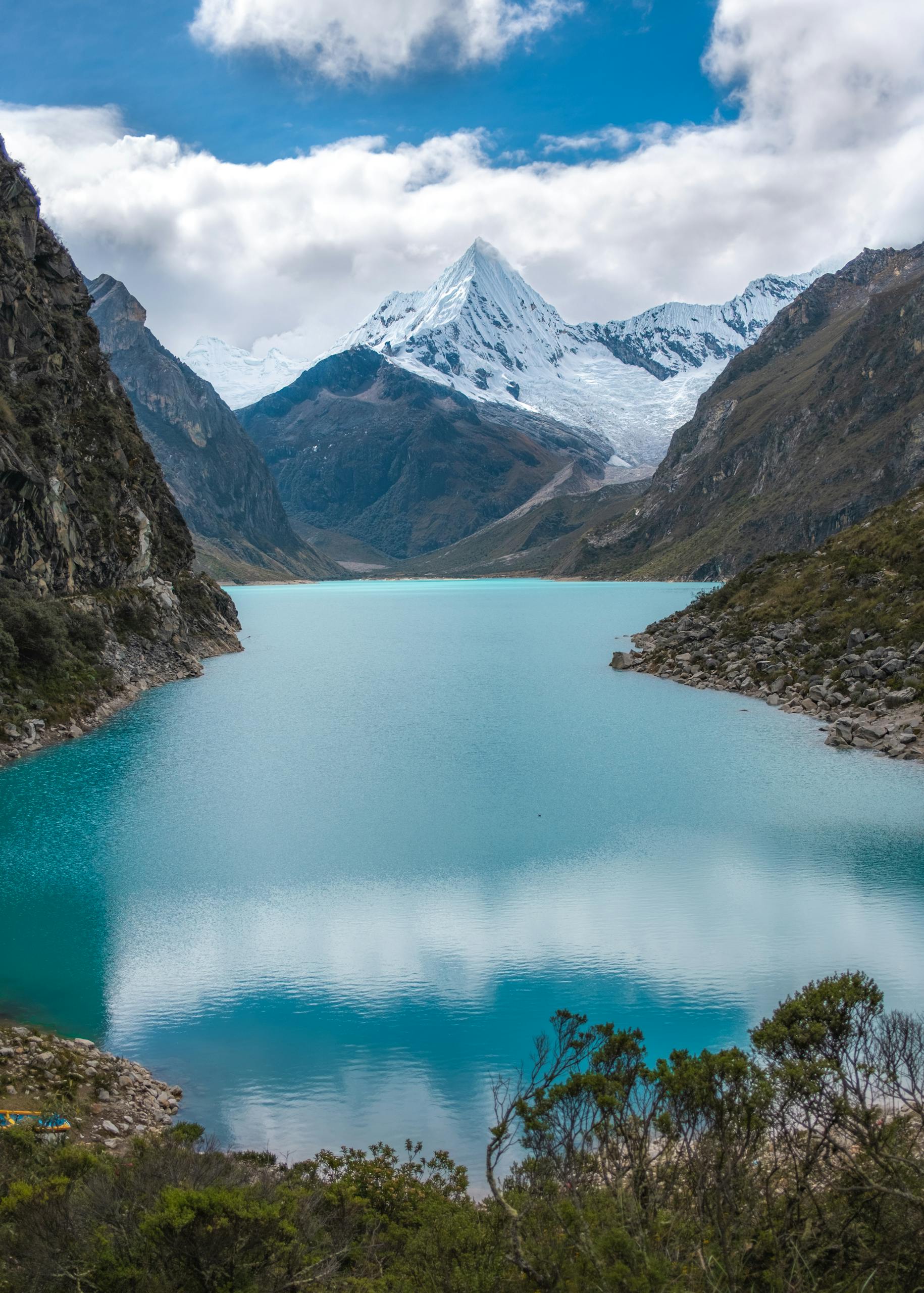 Lake Paron in the Perivian Andes and the Snowcapped Piramide Mountain